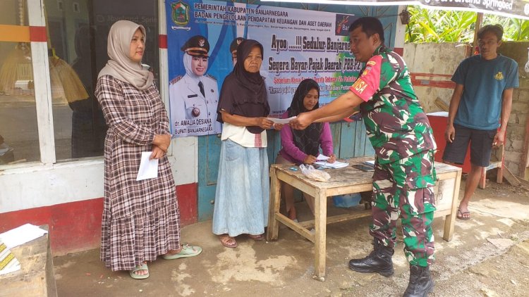 Babinsa Laksanakan Pendampingan Pembayaran Pajak Bumi Dan Bangunan Di Desa Sigeblog