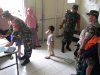 Babinsa Koramil 04 Karangkobar Bantu Bidan Desa Dampingi Giat Posyandu Balita