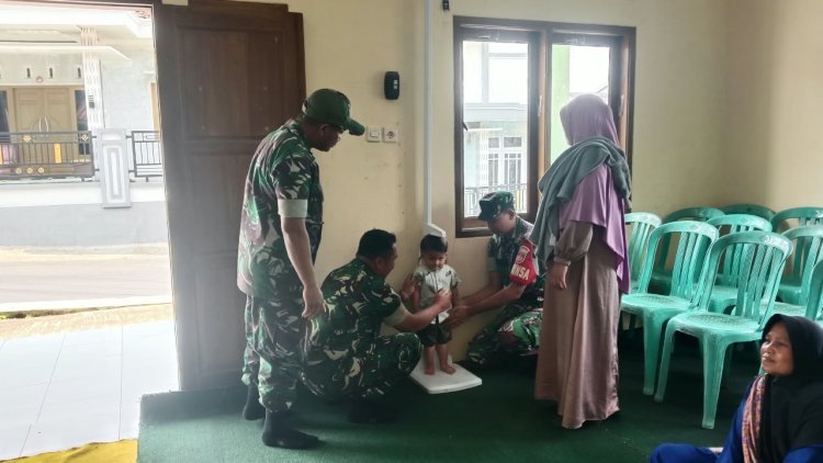 Babinsa Koramil 18 Pagentan Dampingi Kegiatan Posyandu Margo Mulyo 1, Wujud Kepedulian TNI terhadap Kesehatan Balita